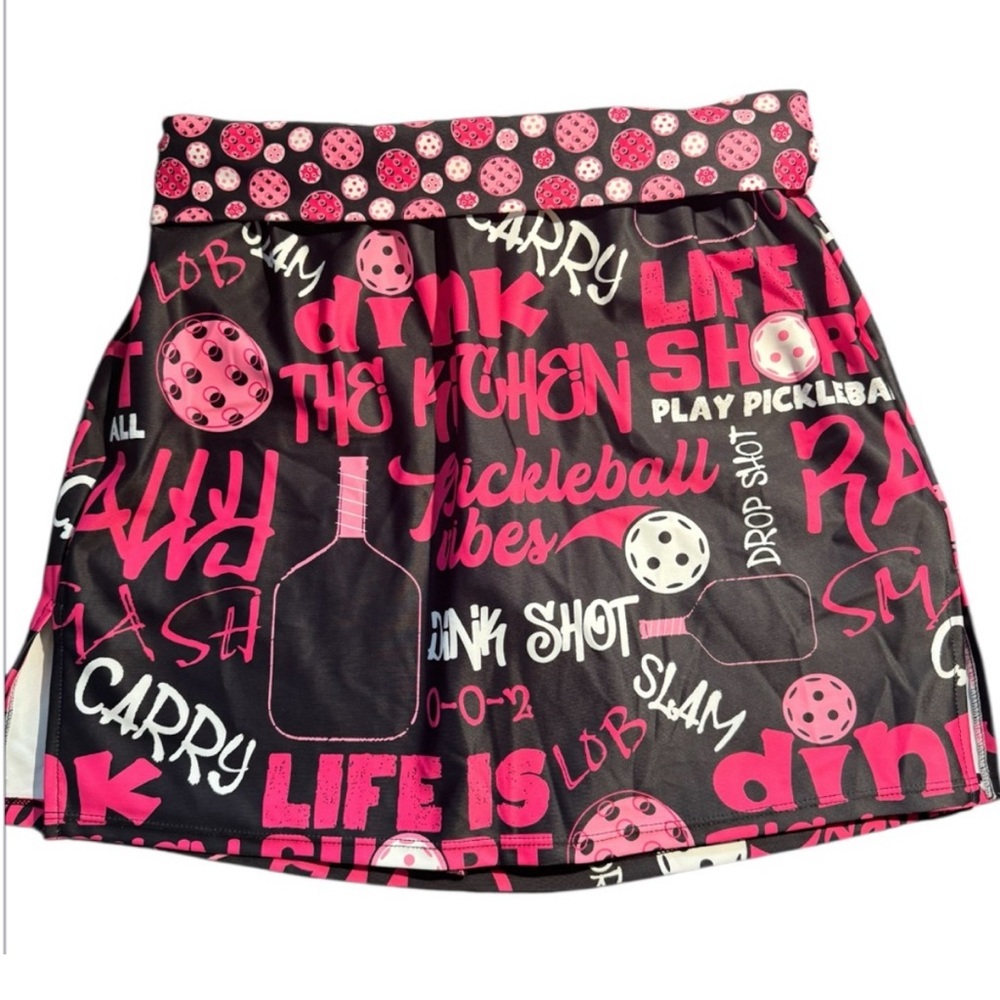 Vibrant black and pink graphic skirt with playful text and patterns.Size XL NWOT
